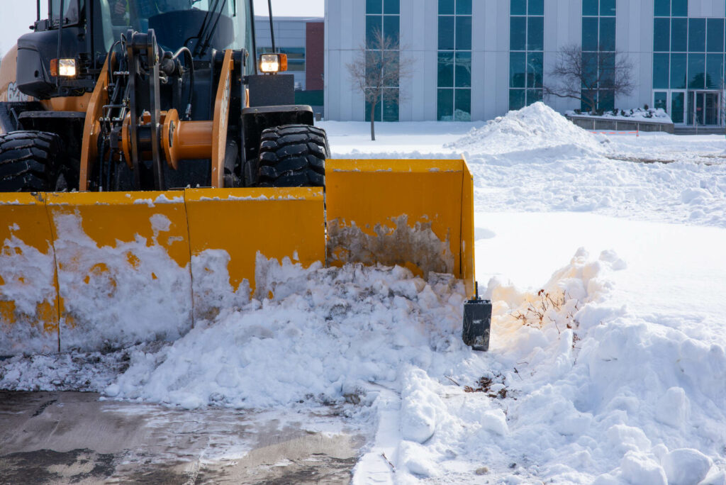 arctic snow and ice HD-pusher-tripping-over-curb