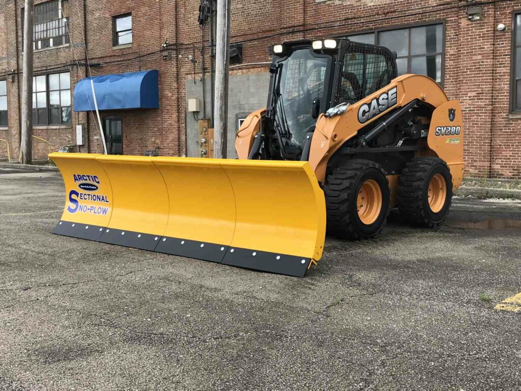 arctic snow and ice sectional snow plow on skid steer