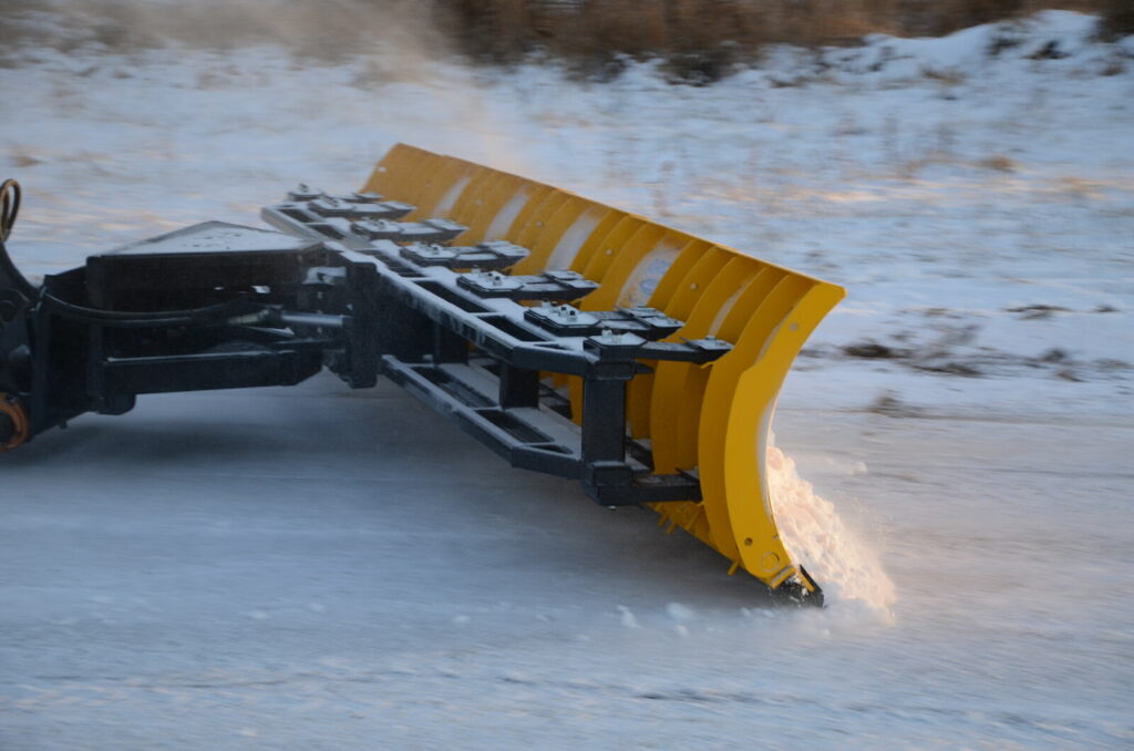 arctic snow and ice sectional snow plow plowing snow attachment