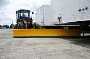 arctic snow and ice side sweeper under truck bed copy