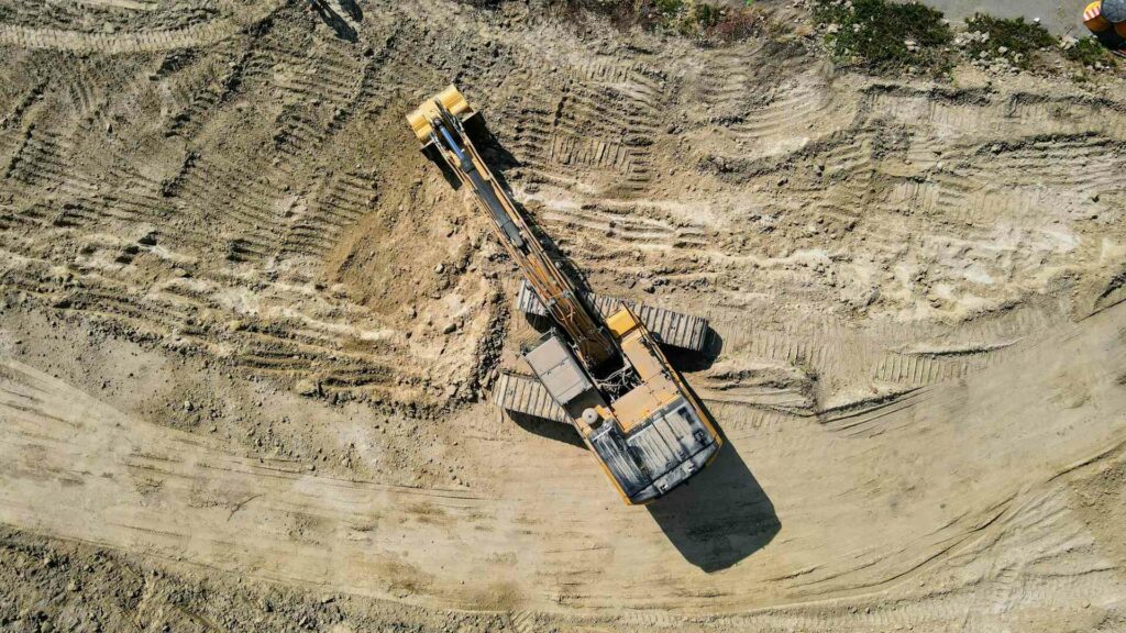 excavator-sizes-above-picture-in-dirt
