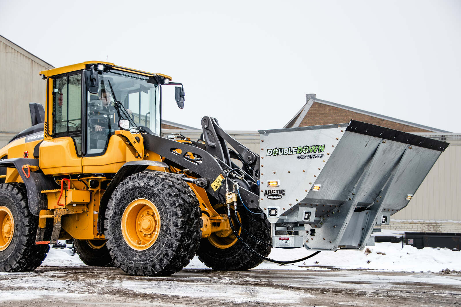 3-yard DoubleDown salt bucket mounted on a loader for Arctic Snow and Ice Control in Western Canada