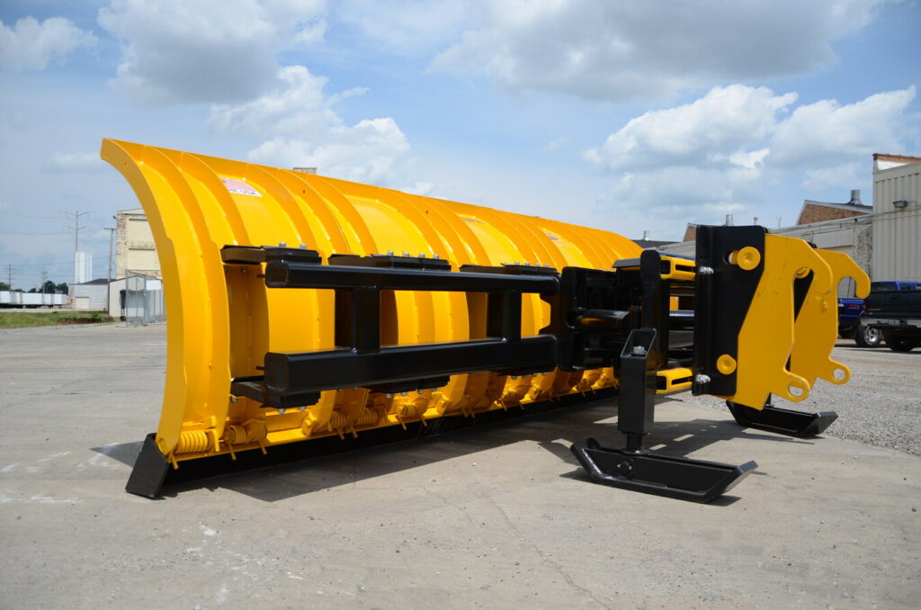 arctic snow and ice Large snow plow attachment with durable framework and hydraulic mounting system for versatile snow clearing