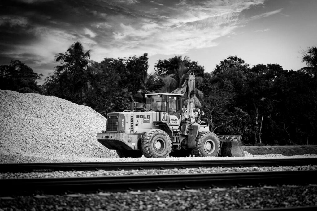 XCMG LW300KN front loader carrying bricks, a reliable machine from Plains Equipment Rentals serving Western Canada