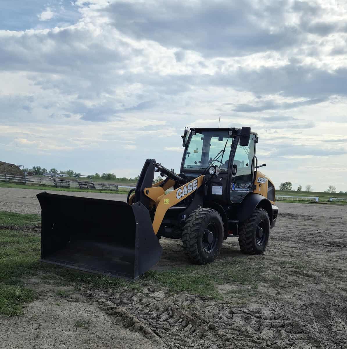 case-321f-wheel-loader-with-bucket-attachment-on-jobsite-western-canada-plains-equipment-rentals