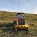 Rear view of John Deere 524K-II loader for sale from Plains Equipment Rentals in Canada