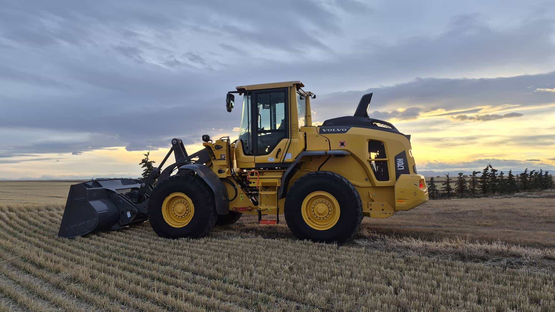 volvo-l70h-side-view-at-sunset-wheel-loader-for-sale-western-canada