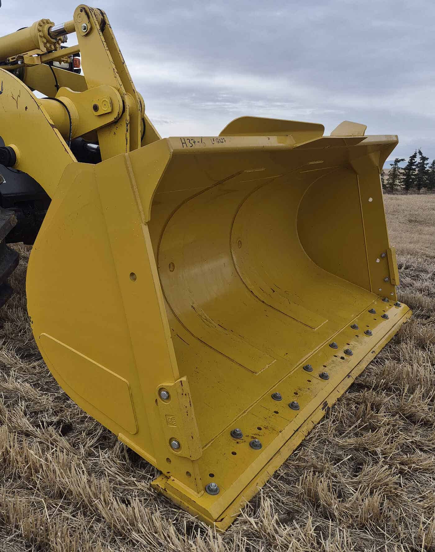 Close up of 2010 Komatsu WA250-6 bucket interior and cutting edge