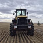Rear view of 2010 Komatsu WA250-6 showing tire alignment and rear counterweight