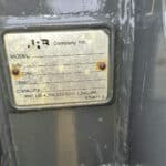 Manufacturer plate on Komatsu WA250-6 bucket attachment