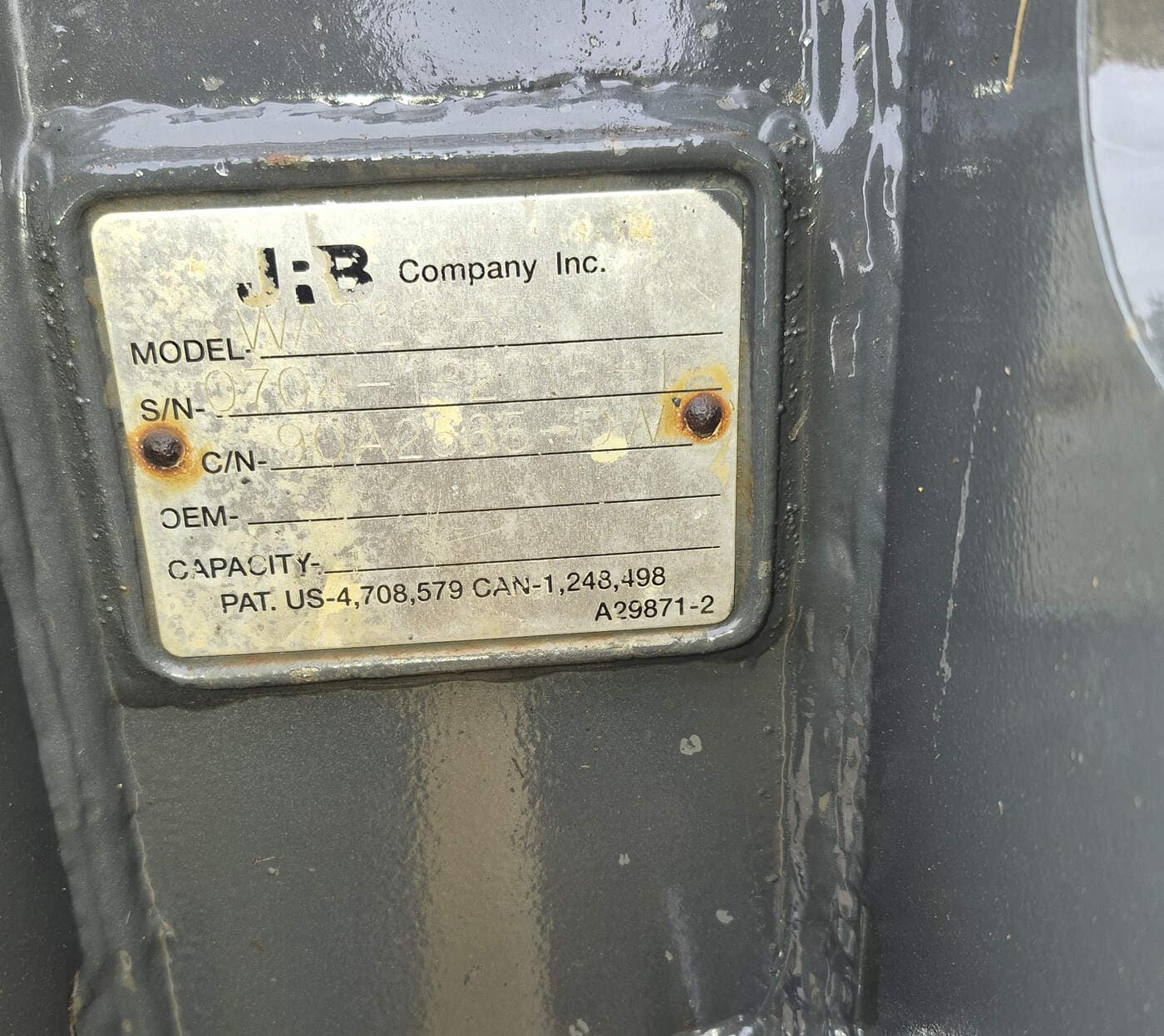 Manufacturer plate on Komatsu WA250-6 bucket attachment