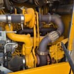 Close-up view of John Deere diesel engine in heavy machinery equipment